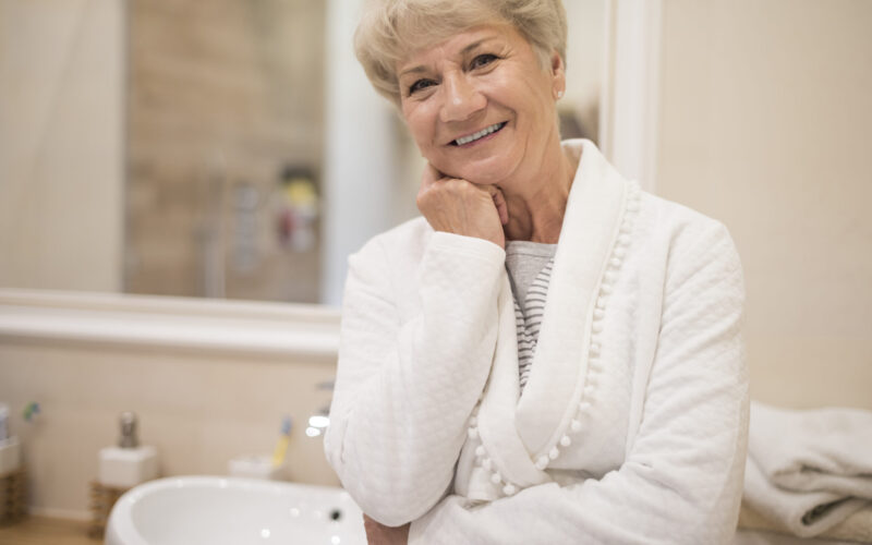 Vital senior woman in the bathroom